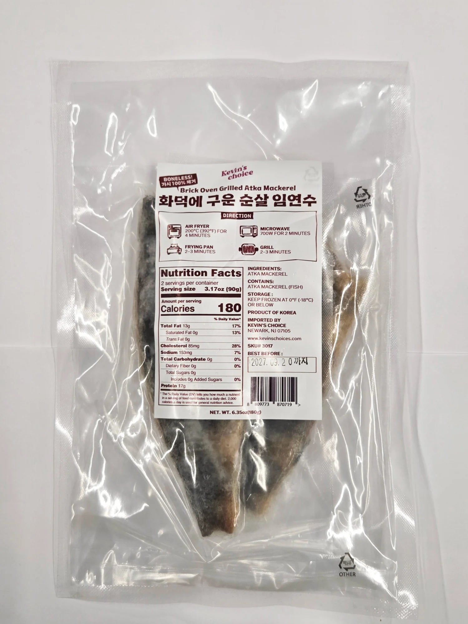 Packaged fish fillet with a label on a white background