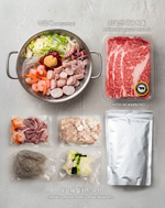 Nakgopsae meal kit components including raw meat, vegetables, and noodles on a gray background.
