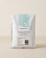 Rice packaging with a label on a beige background